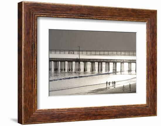 USA, California, Avila Beach. Silhouetted Beach Walkers Approach Pier End of Day-Trish Drury-Framed Photographic Print