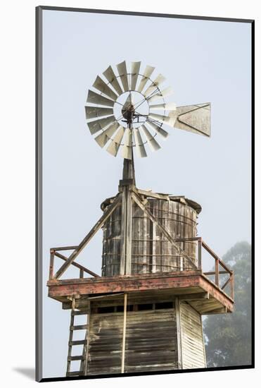 USA California. Cayucos, old wooden water tower with windmill for pumping-Alison Jones-Mounted Photographic Print