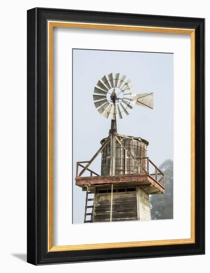 USA California. Cayucos, old wooden water tower with windmill for pumping-Alison Jones-Framed Photographic Print