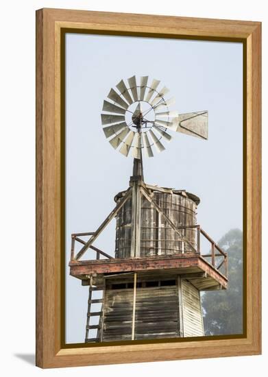 USA California. Cayucos, old wooden water tower with windmill for pumping-Alison Jones-Framed Premier Image Canvas