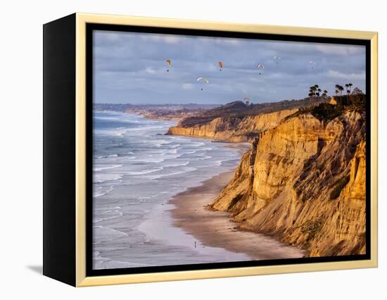 USA, California, La Jolla. Paragliders Float over Black's Beach in Late Afternoon-Ann Collins-Framed Premier Image Canvas