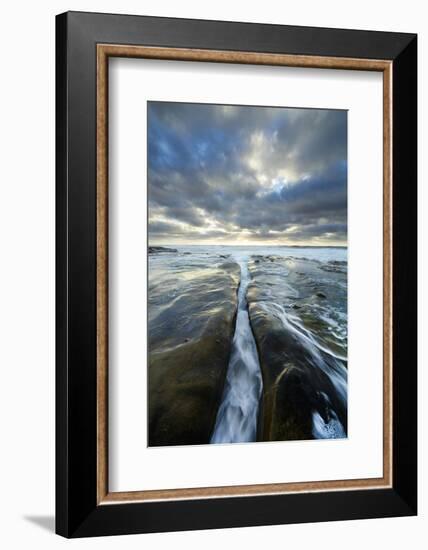 USA, California, La Jolla. Wave flows through cracked sandstone.-Jaynes Gallery-Framed Photographic Print