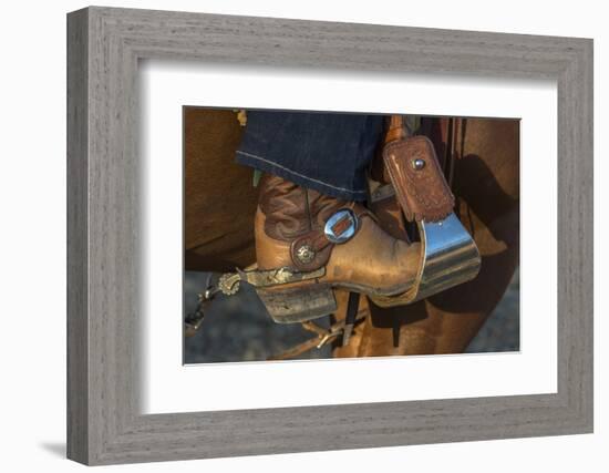 USA, California, Parkfield, V6 Ranch cowgirl boot in stirrup-Ellen Clark-Framed Photographic Print