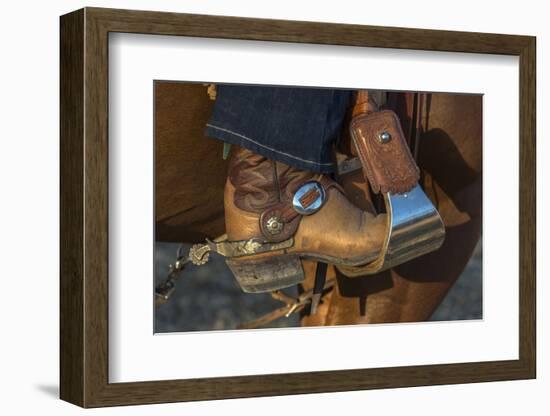 USA, California, Parkfield, V6 Ranch cowgirl boot in stirrup-Ellen Clark-Framed Photographic Print