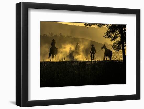 USA, California, Parkfield, V6 Ranch silhouette of riders, on horseback. Early dusty morning.-Ellen Clark-Framed Photographic Print