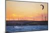 Usa, California, Rio Vista. Kiteboarder at sunset with wind farm turbines.-Merrill Images-Mounted Photographic Print