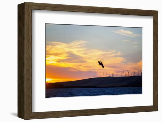 USA, California, Rio Vista, Sacramento River Delta. Kiteboarder catching air at sunset.-Merrill Images-Framed Photographic Print