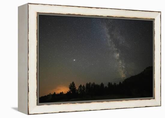 USA, Colorado, Eleven Mile Canyon. The Milky Way galaxy and forest silhouette at night.-Jaynes Gallery-Framed Premier Image Canvas