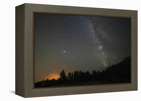 USA, Colorado, Eleven Mile Canyon. The Milky Way galaxy and forest silhouette at night.-Jaynes Gallery-Framed Premier Image Canvas