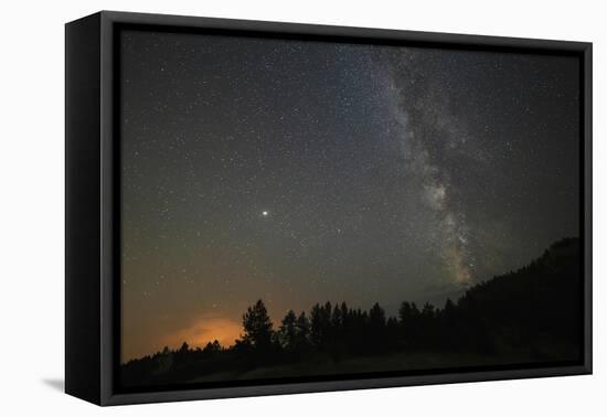 USA, Colorado, Eleven Mile Canyon. The Milky Way galaxy and forest silhouette at night.-Jaynes Gallery-Framed Premier Image Canvas