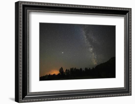 USA, Colorado, Eleven Mile Canyon. The Milky Way galaxy and forest silhouette at night.-Jaynes Gallery-Framed Photographic Print