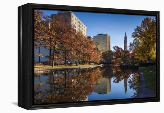 USA, Connecticut, Hartford, Bushnell Park, reflection of office buildings and Travelers Tower-Walter Bibikow-Framed Premier Image Canvas