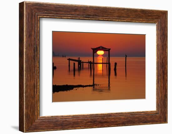 USA, Florida, Apalachicola, Sunrise at an old boat house at Apalachicola Bay.-Joanne Wells-Framed Photographic Print