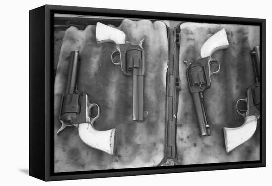 USA, Florida, Plant City, Guns on Display for a Cowboy Mounted Shooting Competition-Connie Bransilver-Framed Premier Image Canvas