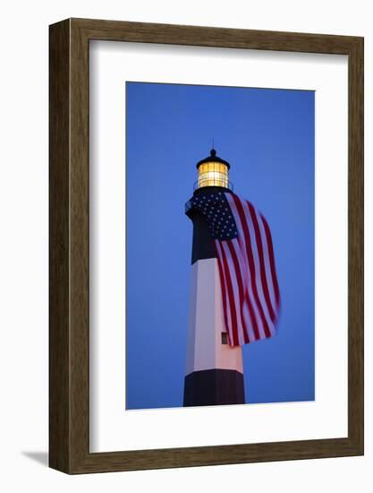 USA, Georgia, Tybee Island, Flag flying on lighthouse at Tybee Island.-Joanne Wells-Framed Photographic Print