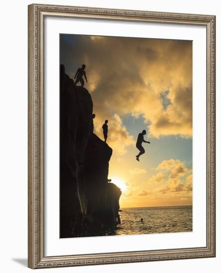 USA, Hawaii, Oahu,  North Shore, Waimea Bay, Divers Jumping Off Cliff-Michele Falzone-Framed Photographic Print