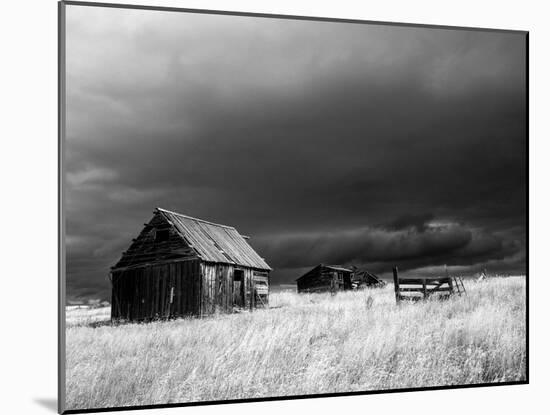 USA, Idaho, Highway 36, Liberty storm passing over old wooden barn-Sylvia Gulin-Mounted Photographic Print