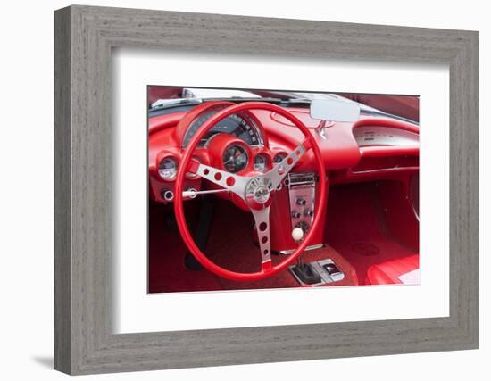 USA, Indiana, Carmel. Red steering wheel and dashboard in a classic Chevy Corvette.-Jaynes Gallery-Framed Photographic Print