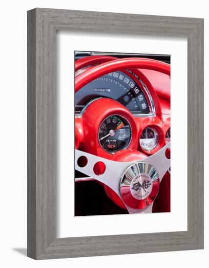 USA, Indiana, Carmel. Red steering wheel and dashboard in a classic Chevy Corvette.-Jaynes Gallery-Framed Photographic Print
