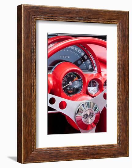 USA, Indiana, Carmel. Red steering wheel and dashboard in a classic Chevy Corvette.-Jaynes Gallery-Framed Photographic Print