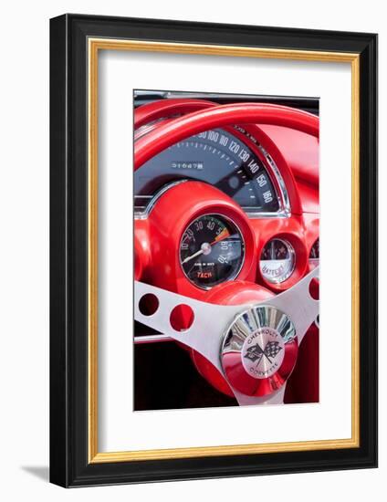 USA, Indiana, Carmel. Red steering wheel and dashboard in a classic Chevy Corvette.-Jaynes Gallery-Framed Photographic Print