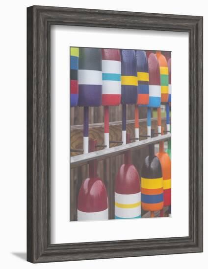 USA, Maine Cape Neddick. New lobster buoys for sale.-Walter Bibikow-Framed Photographic Print