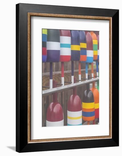 USA, Maine Cape Neddick. New lobster buoys for sale.-Walter Bibikow-Framed Photographic Print