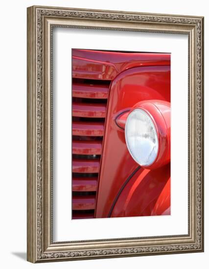 USA, Maine, Owl's Head. Headlight and partial grill of a red antique truck.-Jaynes Gallery-Framed Photographic Print