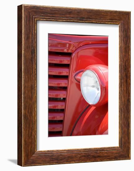 USA, Maine, Owl's Head. Headlight and partial grill of a red antique truck.-Jaynes Gallery-Framed Photographic Print