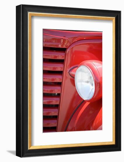 USA, Maine, Owl's Head. Headlight and partial grill of a red antique truck.-Jaynes Gallery-Framed Photographic Print