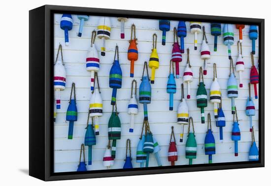 USA, Maine, Stonington, Decorative Lobster Buoys-Walter Bibikow-Framed Premier Image Canvas