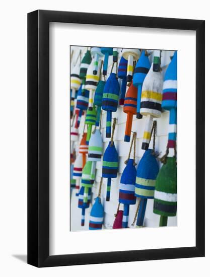 USA, Maine, Stonington, Decorative Lobster Buoys-Walter Bibikow-Framed Photographic Print