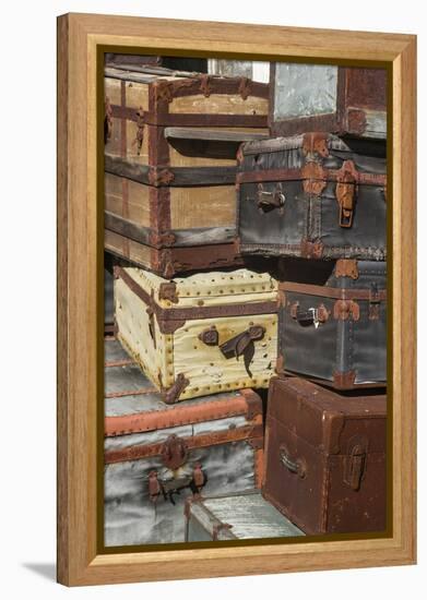 USA, Maine, Wells, antique luggage outside of old train station-Walter Bibikow-Framed Premier Image Canvas