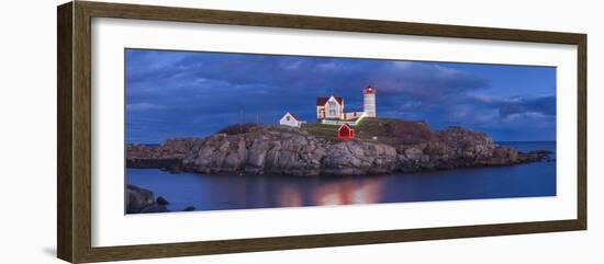 USA, Maine, York Beach, Nubble Light Lighthouse with Christmas decorations, dusk-Walter Bibikw-Framed Photographic Print