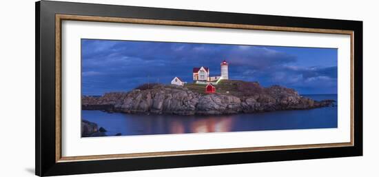 USA, Maine, York Beach, Nubble Light Lighthouse with Christmas decorations, dusk-Walter Bibikw-Framed Photographic Print