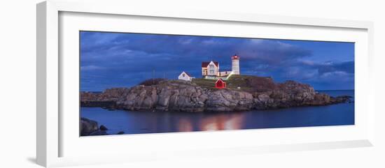 USA, Maine, York Beach, Nubble Light Lighthouse with Christmas decorations, dusk-Walter Bibikw-Framed Photographic Print