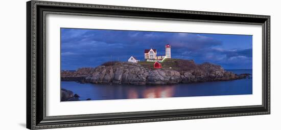 USA, Maine, York Beach, Nubble Light Lighthouse with Christmas decorations, dusk-Walter Bibikw-Framed Photographic Print