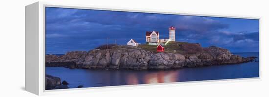 USA, Maine, York Beach, Nubble Light Lighthouse with Christmas decorations, dusk-Walter Bibikw-Framed Premier Image Canvas