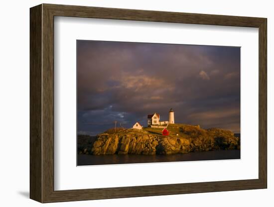 USA, Maine, York Beach, Nubble Light Lighthouse with Christmas decorations, sunset-Walter Bibikow-Framed Photographic Print