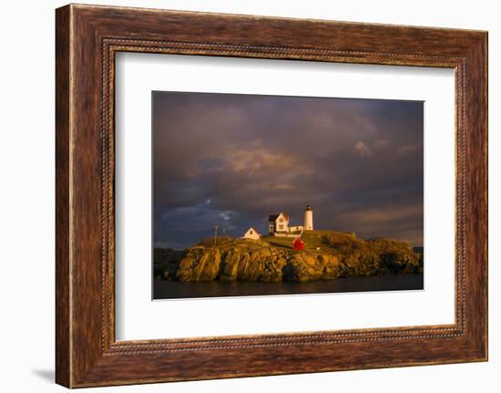 USA, Maine, York Beach, Nubble Light Lighthouse with Christmas decorations, sunset-Walter Bibikow-Framed Photographic Print