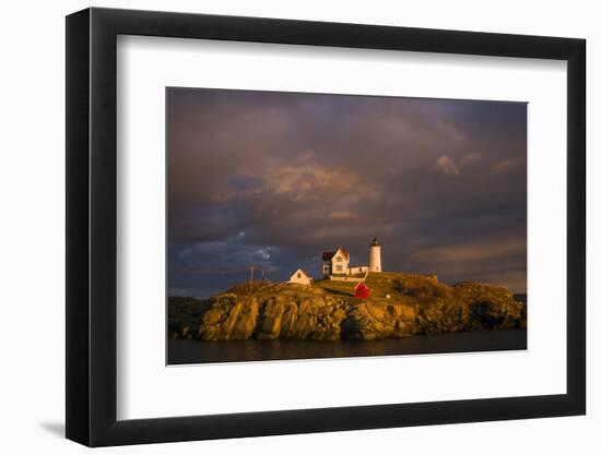 USA, Maine, York Beach, Nubble Light Lighthouse with Christmas decorations, sunset-Walter Bibikow-Framed Photographic Print