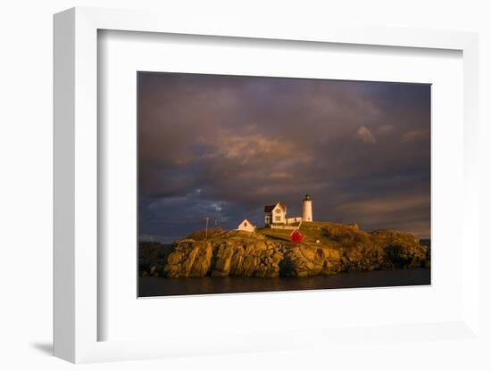 USA, Maine, York Beach, Nubble Light Lighthouse with Christmas decorations, sunset-Walter Bibikow-Framed Photographic Print