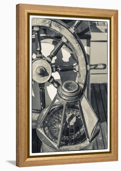 USA, Massachusetts, Cape Ann, Gloucester, schooner marine compass and ship's wheel-Walter Bibikow-Framed Premier Image Canvas