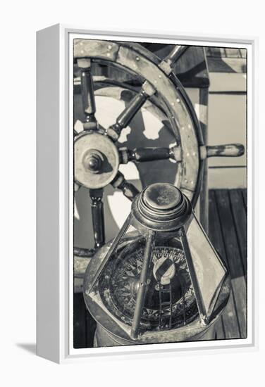 USA, Massachusetts, Cape Ann, Gloucester, schooner marine compass and ship's wheel-Walter Bibikow-Framed Premier Image Canvas