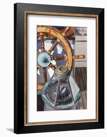 USA, Massachusetts, Cape Ann, Gloucester, schooner marine compass and ship's wheel-Walter Bibikow-Framed Photographic Print