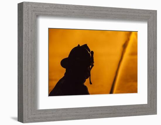 USA, Massachusetts, Cape Ann, Rockport. Fourth of July parade, firemen silhouettes by bonfire.-Walter Bibikow-Framed Photographic Print