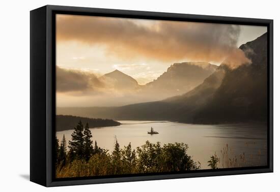 USA, Montana, Glacier NP. Sunrise pierces clouds over St. Mary Lake.-Don Grall-Framed Premier Image Canvas