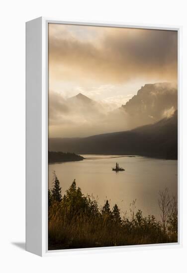 USA, Montana, Glacier NP. Sunrise pierces clouds over St. Mary Lake.-Don Grall-Framed Premier Image Canvas