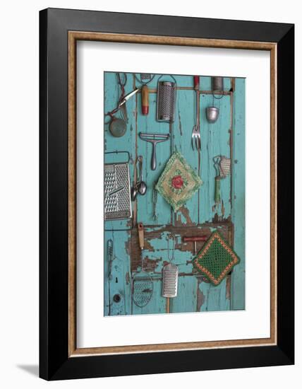 USA, Montana, Missoula. Old fashioned kitchen implements displayed on weathered door.-Jaynes Gallery-Framed Photographic Print