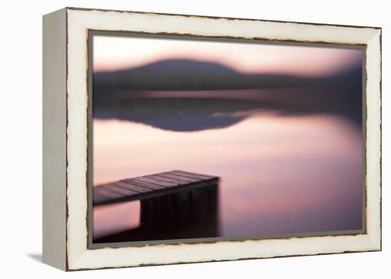 Usa, New Hampshire, Lyme. Dock and reflection of mountain in Hinman Pond at sunset.-Merrill Images-Framed Premier Image Canvas